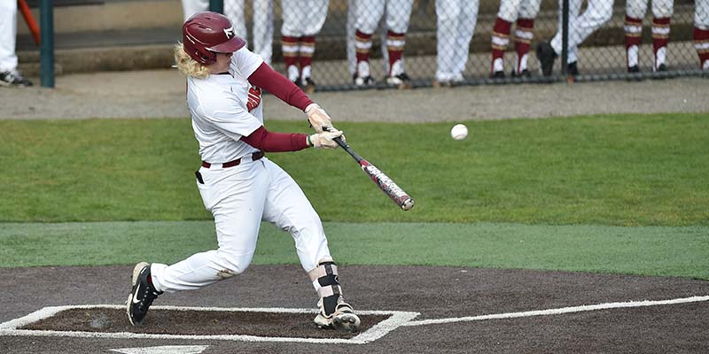Layton Wagner hits the ball for Willamette.