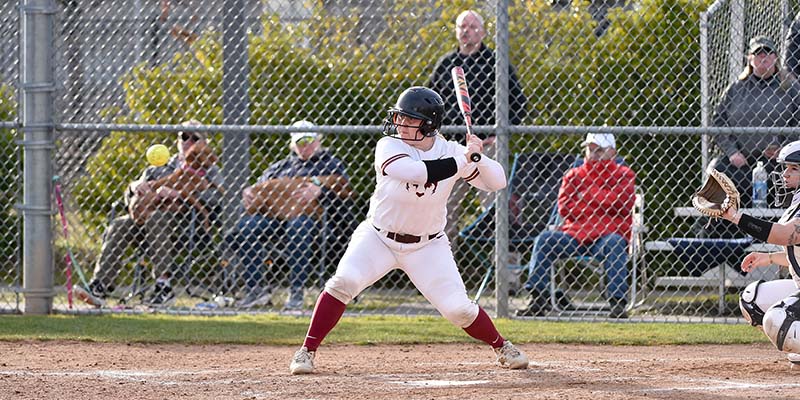 Cora Erickson is ready to swing as the ball nears home plate.