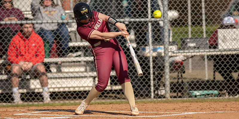 Mia Rogers takes a swing for the Willamette University softball team.