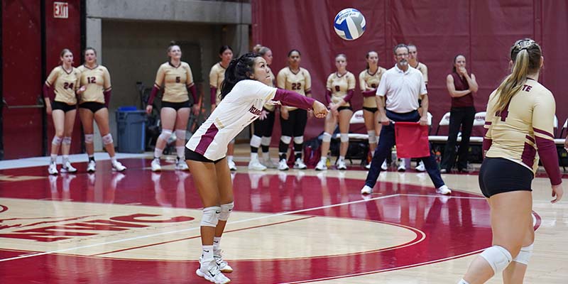 Shyla Sato earns a dig for Willamette.