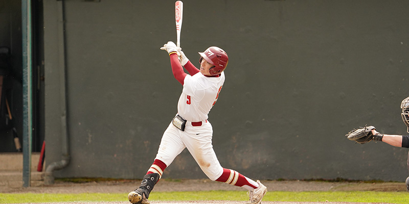 Carl Lawson records a hit for the Willamette University baseball team. 