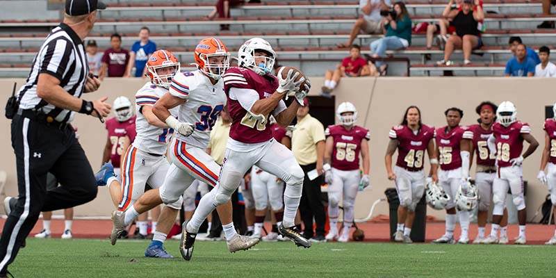 Tyler Epefanio catches a pass for the Bearcats