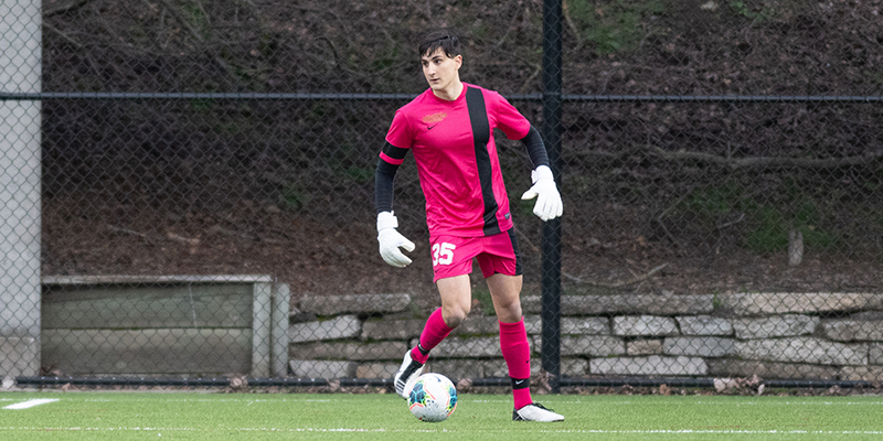 Goalkeeper Pierluca Carnovale looks up the field while controlling the ball at this feet.