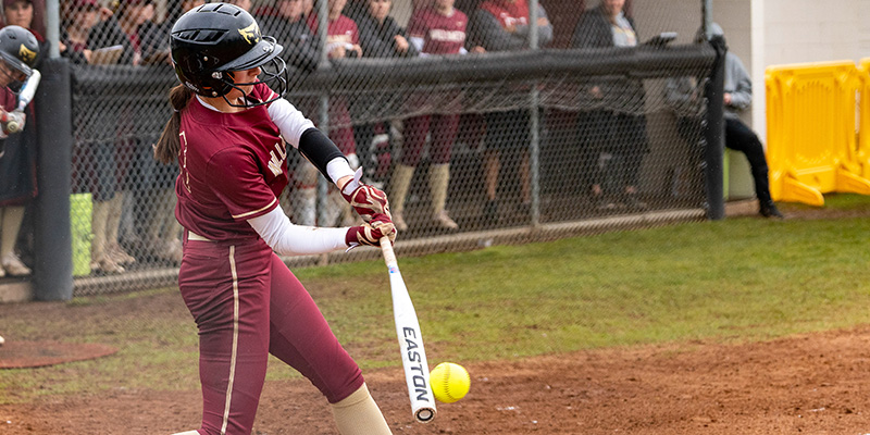 Faith Coller swings and hits the ball for the Bearcats.