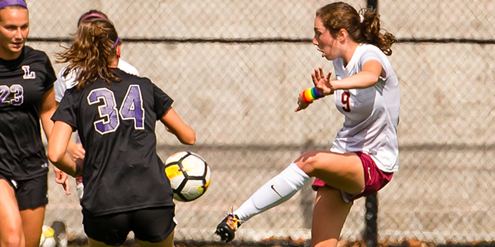 Jackie Gilroy looks to move the ball upfield for the Bearcats