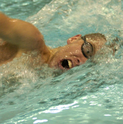 Pacific Swimmers Outscore Bearcats in NWC Action
