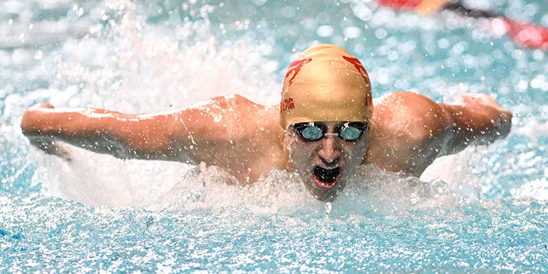 Cole Lindberg swims the butterfly for Willamette.